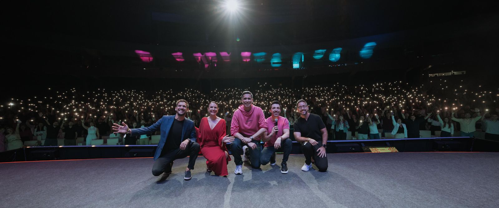 Ulisses Carneiro no palco ao lado de Flávio Augusto e Caio Carneiro